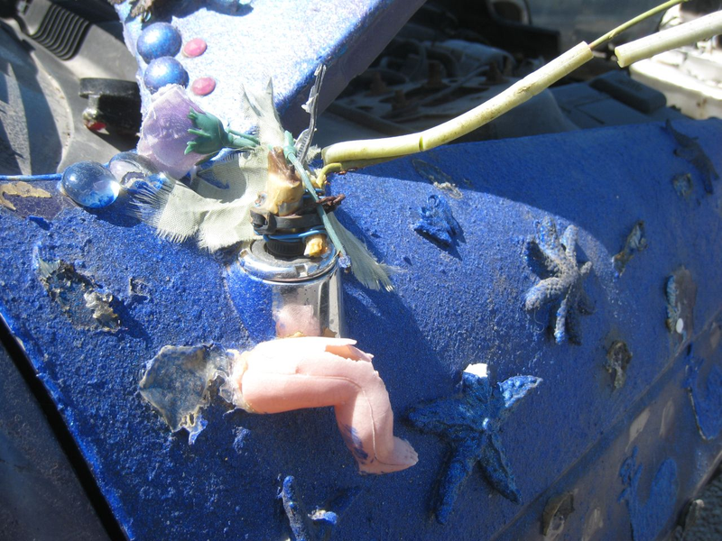Illustration for article titled Groovalicious Purple Princess Of Peace Art Car Falls On Hard Times, Faces Crusher